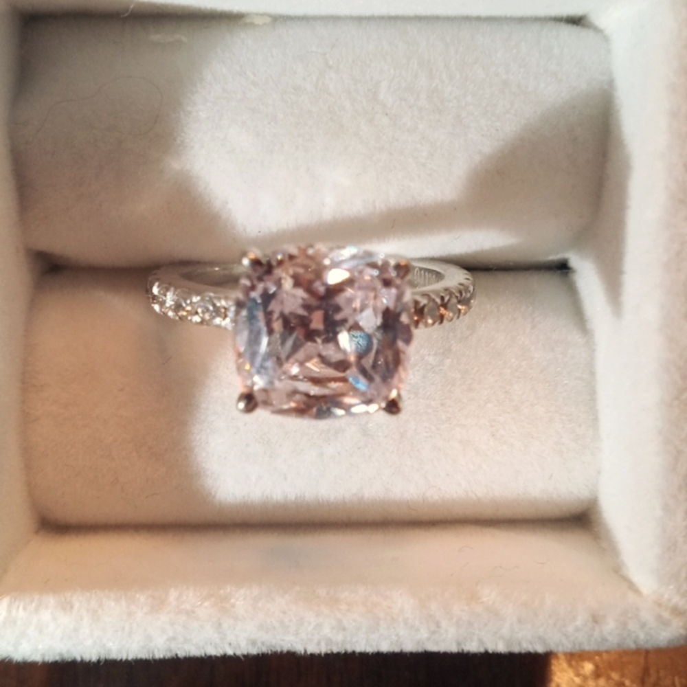 4 carat lab created diamond set in 14k white gold with smaller diamond's